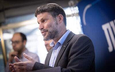Finance Minister Bezalel Smotrich leads a faction meeting of his Religious Zionism party at the Knesset, in Jerusalem, July 17, 2023. (Chaim Goldberg/Flash90)