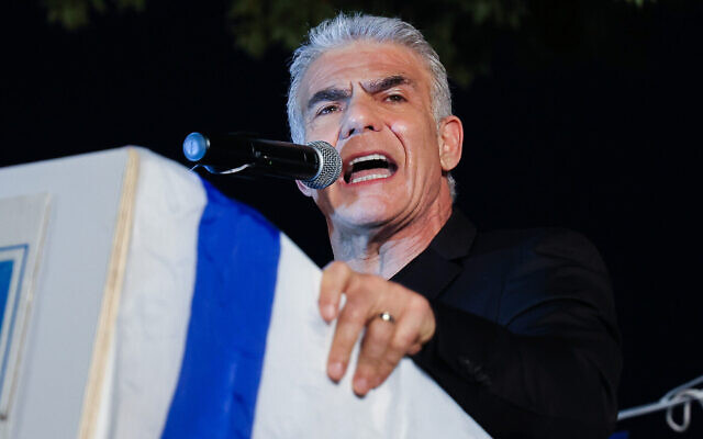 Opposition leader Yair Lapid speaks at a protest against the judicial overhaul, in Modiin, July 22, 2023. (Jonathan Shaul/Flash90)