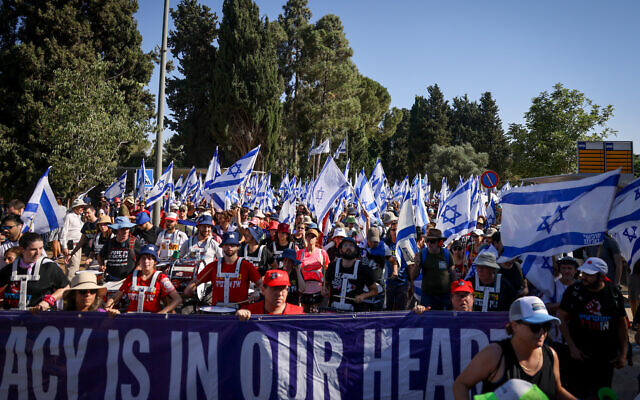 Anti-overhaul protesters march in Jerusalem on July 23, 2023. (Chaim Goldberg/Flash90)
