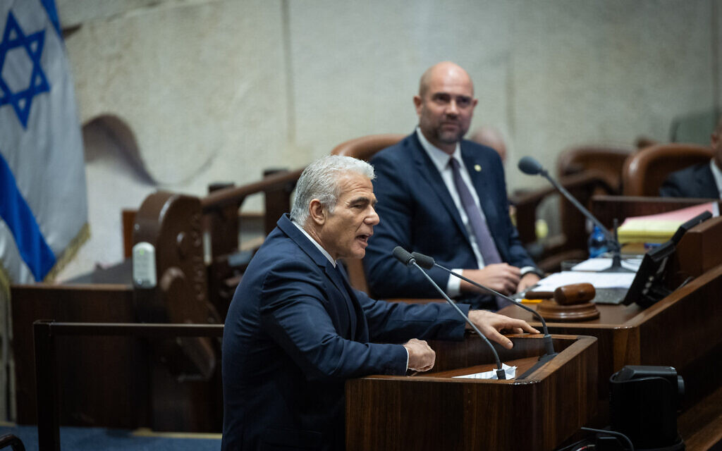 Opposition leader Yair Lapid addresses the Knesset plenum ahead of the passage of the 'reasonableness' law, July 24, 2023. (Yonatan Sindel/Flash90)
