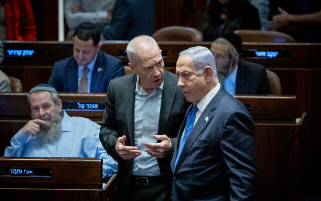 Prime Minister Benjamin Netanyahu and Defense Minister Yoav Galant attend a vote on the reasonableness bill in the Knesset, July 24, 2023. (Yonatan Sindel/Flash90)