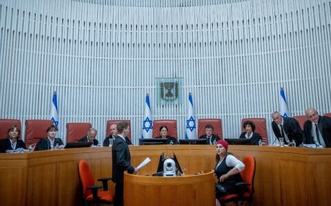 President of the Supreme Court Esther Hayut and Supreme Court justices at the High Court in Jerusalem hear petitions against the so-called 'Tiberias law,' on July 30, 2023. (Yonatan Sindel/Flash90)