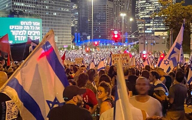 Israelis protest against the government's judicial overhaul in Tel Aviv's Kaplan Street on July 18, 2023 (Carrie Keller-Lynn/Times of Israel)