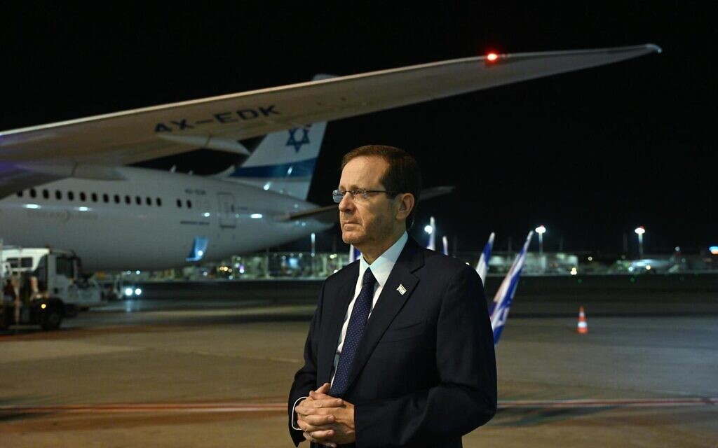 President Isaac Herzog at Ben-Gurion airport before taking off for Washington on July 18, 2023. (Haim Zach/GPO)