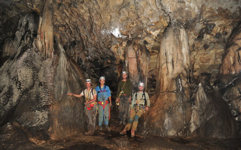 A team of researchers explores the "Portal to Hades" in the Teomim Caves near Beit Shemesh during a recent expedition. (courtesy Boaz Zissu)