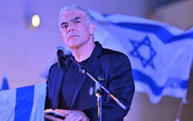 Opposition leader Yair Lapid speaks at an anti-judicial overhaul protest in Hod Hasharon, July 15, 2023. (Courtesy)