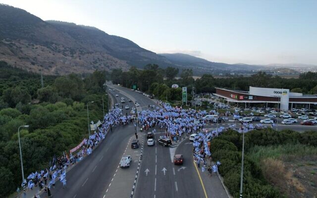 Anti-overhaul demonstrators block the Gome Junction in northern Israel on July 29, 2023. (Eitan Slonim) Anti-overhaul demonstrators block the Gome Junction in northern Israel on July 29, 2023. (Eitan Slonim)