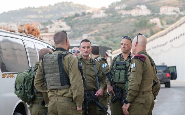 IDF Chief of Staff Herzi Halevi (center) speaks with officers near the northern border with Lebanon, July 18, 2023. (Israel Defense Forces)