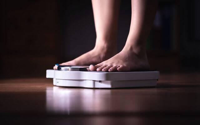 Illustrative: Feet on a scale (Tero Vesalainen; iStock by Getty Images)