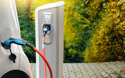 An illustrative photo of a charging electric car. (Scharfsinn86 via iStock by Getty Images)