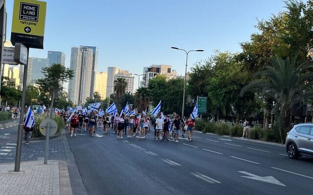 Protesters march on Tel Aviv’s Namir Street, July 24, 2023. (Naomi Lanzkron)
