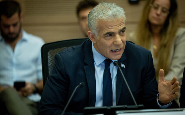 Opposition Leader Yair Lapid attends a Constitution, Law and Justice Committee meeting at the Knesset in Jerusalem on July 11, 2023. (Yonatan Sindel/Flash90)