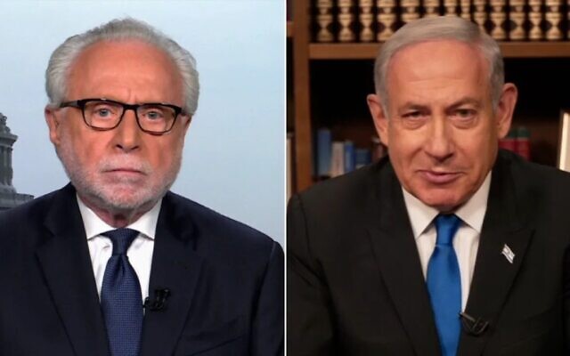 Prime Minister Benjamin Netanyahu  (R) speaks to CNN's Wolf Blitzer in an interview aired Thursday, July 27, 2023, days after his government passed the controversial reasonableness law. (Screenshot/CNN, used in accordance with clause 27a of the copyright law)