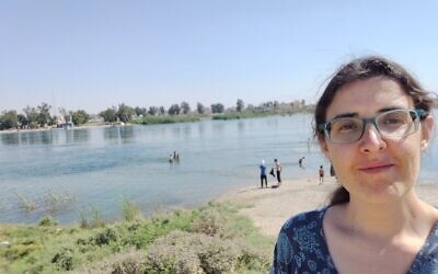 Elizabeth Tsurkov on the banks of the Euphrates river in Raqqa, Syria, during a research trip she conducted to northern Iraq, north-eastern Syria and Turkey in July 2019 (Facebook/used in accordance with Clause 27a of the Copyright Law)
