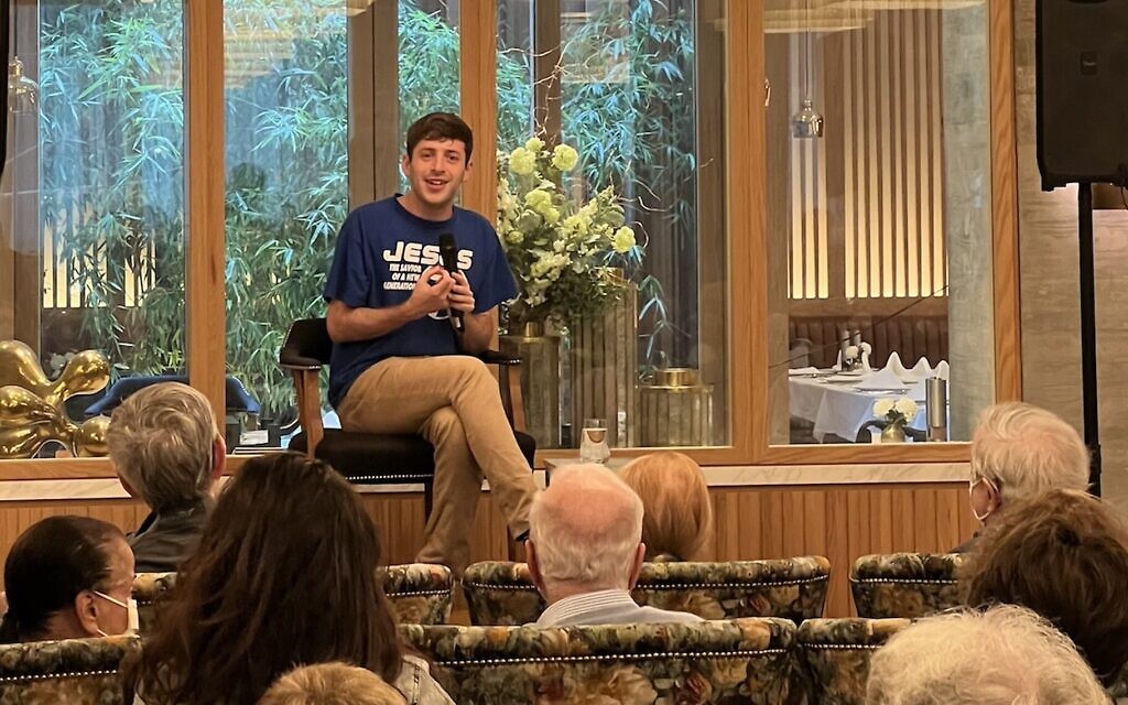 Jewish comedian Alex Edelman speaks to seniors at Inspir Jewish Living about his solo Broadway show 'Just for Us.' (Hundred Stories PR via JTA)
