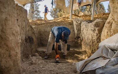 Archaeologists excavate the oldest gate discovered in Israel at Tel Erani near Kiryat Gat in 2023. (Yoli Schwartz/IAA)