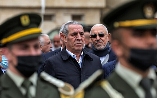 Hussein al-Sheikh, secretary-general of the Executive Committee of the Palestine Liberation Organization (PLO), attends the funeral of prime minister Ahmad Qurei in the city of Ramallah in the West Bank on February 22, 2023. (AHMAD GHARABLI / AFP)
