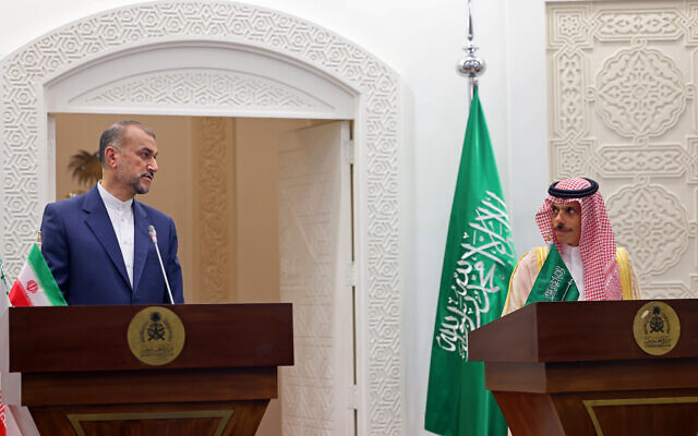 Iran's Foreign Minister Hossein Amir-Abdollahian, left, and his Saudi counterpart Faisal bin Farhan hold a joint press conference in Riyadh on August 17, 2023. (Fayez Nureldine/AFP)