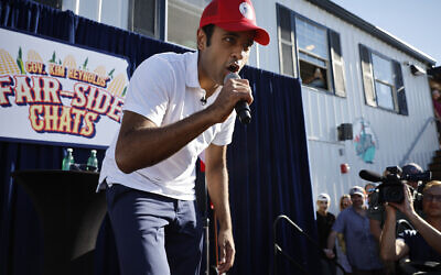 Biotech millionaire and Republican presidential candidate Vivek Ramaswamy raps to Eminem's "Lose Yourself" at the conclusion of one of Iowa Governor Kim Reynolds' "Fair-Side Chats" at the Iowa State Fair, in Des Moines, Iowa, on August 12, 2023. (Chip Somodevilla/Getty Images via JTA)