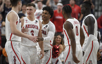 Illustrative: The Arizona Wildcats celebrate during the semifinal PAC-12 conference tournament game at T-Mobile Arena in Las Vegas, March 11, 2022. (AAron Ontiveroz/ MediaNews Group/ The Denver Post via Getty Images via JTA)