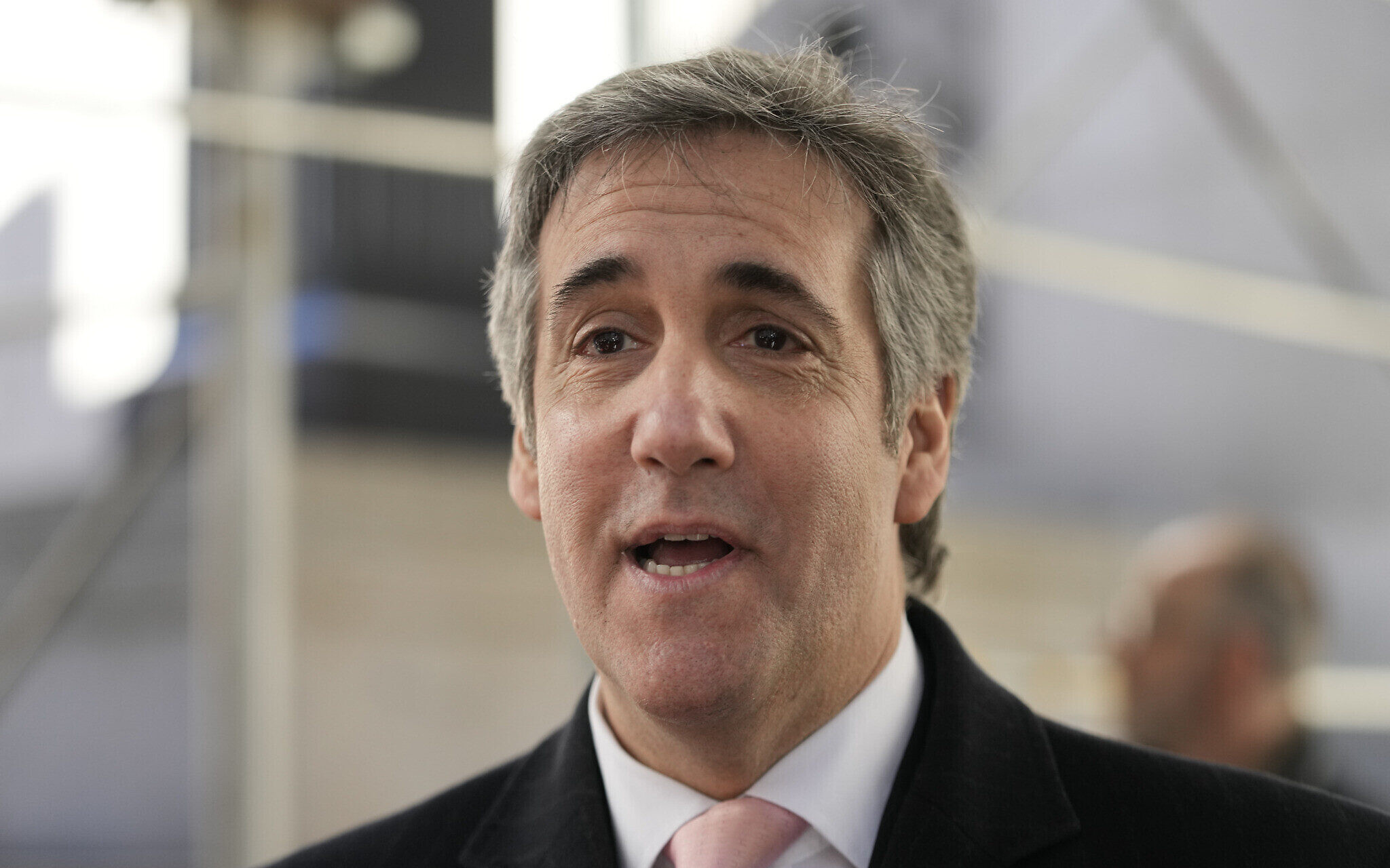 FILE - Michael Cohen leaves the District Attorney's office after testifying  before a grand jury investigating Donald Trump in New York, on March 13,  2023. Cohen, former President Donald Trump's onetime personal