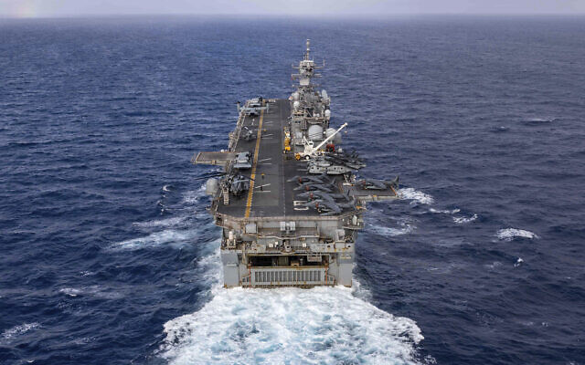 US mulls armed troops on commercial ships in Strait of Hormuz to stop ...