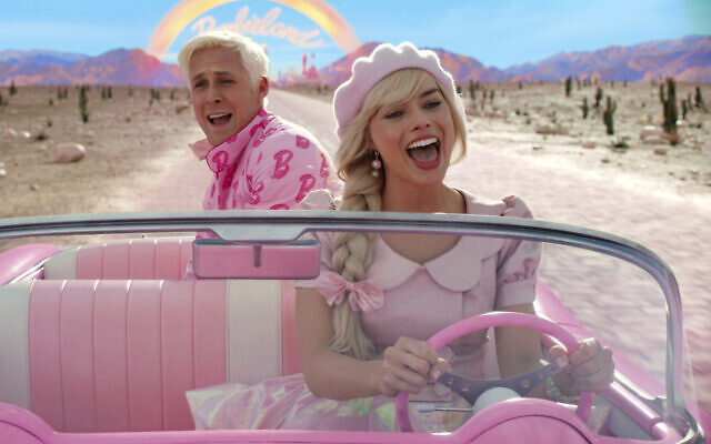 This image released by Warner Bros. Pictures shows Ryan Gosling, left, and Margot Robbie in a scene from 'Barbie' (Warner Bros. Pictures via AP, File)