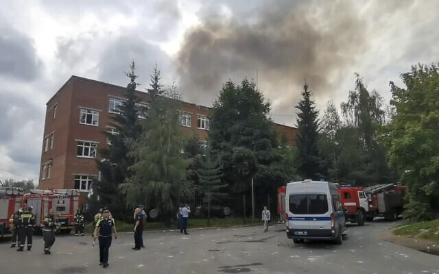 In this photo taken from video and released on Aug. 9, 2023, smoke rises from the Zagorsk Optical and Mechanical Plant in the city of Sergiev Posad, Moscow Region, (Administration of Sergiev Posad municipal district of Moscow region telegram channel via AP)