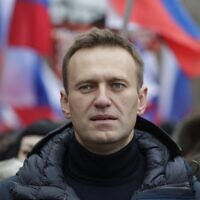 In this Sunday, February 24, 2019, file photo, Russian opposition activist Alexei Navalny takes part in a march in memory of opposition leader Boris Nemtsov in Moscow, Russia. (AP/Pavel Golovkin, File)