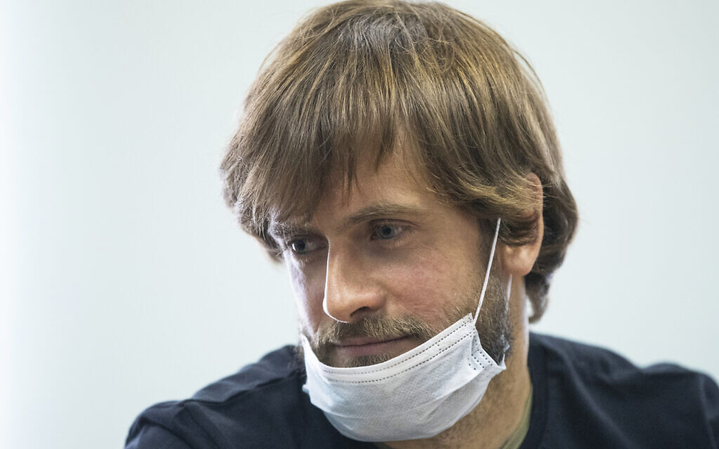 In this Thursday, June 25, 2020 file photo, Pyotr Verzilov, prominent member of the protest group Pussy Riot waits for his court hearing in a court in Moscow, Russia. In 2018, the founder of the protest group Pussy Riot, fell severely ill and also was flown to Berlin, where doctors said poisoning was 'highly plausible.' He eventually recovered. (AP/Pavel Golovkin, File)