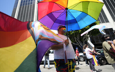 File: LGBTQ supporters hold a rally outside the Los Angeles Unified School District headquarters as they stand against the Leave Our Kids Alone, a group opposing LGBTQ education, at a demonstration in Los Angeles, August 22, 2023. (AP Photo/Damian Dovarganes)