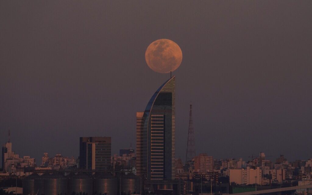 A supermoon rises over Montevideo, Uruguay, August 30, 2023. (Matilde Campodonico/AP)