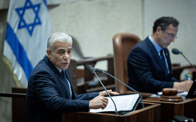 File: Opposition leader Yair Lapid during a discussion and a vote at the Knesset, in Jerusalem, July 30, 2023. (Yonatan Sindel/Flash90)