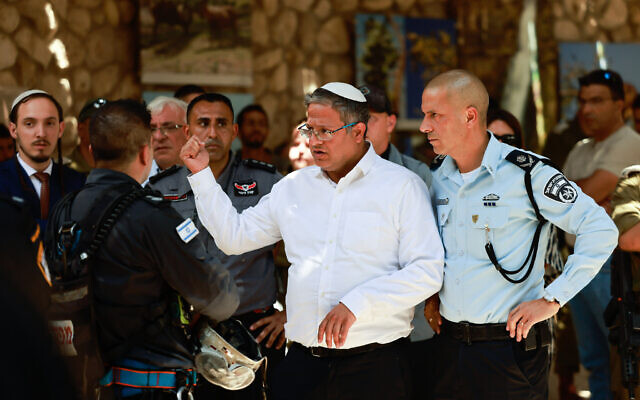 National Security Minister Itamar Ben Gvir near the scene where one person died and a few were injured in a rockslide in Ein Gedi nature reserve, near the Dead Sea, on August 24, 2023. (Chaim Goldberg/Flash90)