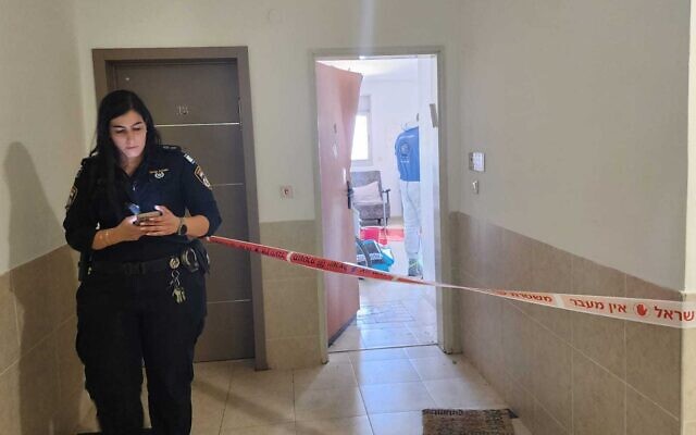 Police working at the site of a suspected murder in Hadera on August 27, 2023. (Israel Police)