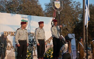 Pic: R-L: Col. Eliav Elbaz the outgoing head of the Binyamin Regional Brigade, Brig. Gen. Avi Blot, the head of the Judea and Samaria Division, and Col. Liran Biton, the incoming head of the Binyamin Regional Brigade, at a change ceremony in Shilo, August 23, 2023. (Israel Defense Forces)