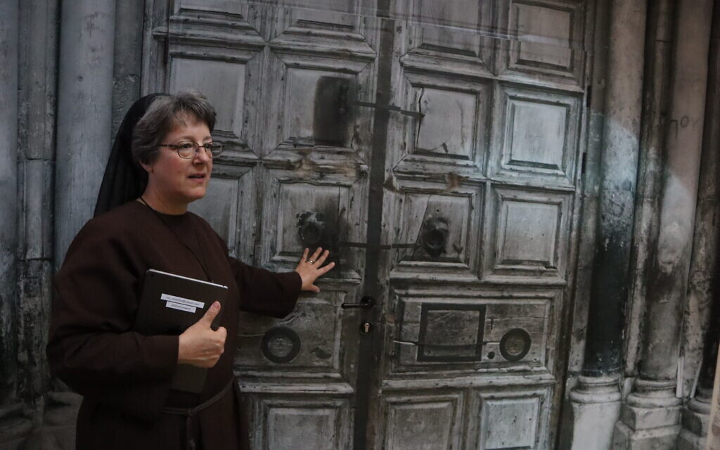 Sister Naomi Zimmerman at the entrance to the multimedia experience at the Christian Information Center in Jerusalem. (Shmuel Bar-Am)