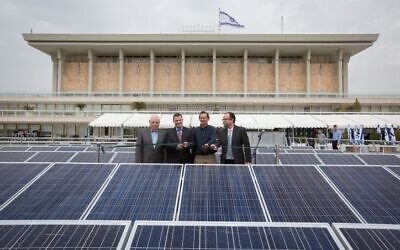 The Knesset cut a ribbon for new solar panels on March 29, 2015. But the Jerusalem Municipality gets poor marks for solar provision on existing facilities according to an index of local authorities launched on August 8, 2023. (Miriam Alster/FLASH90)