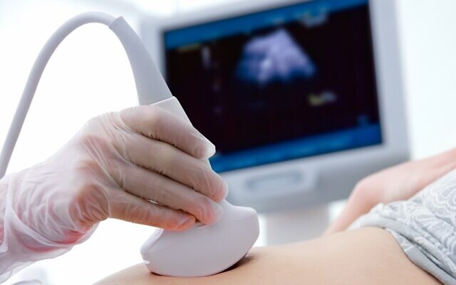 An illustrative photo of an abdominal ultrasound during early pregnancy. (AlexRaths via iStock by Getty Images)