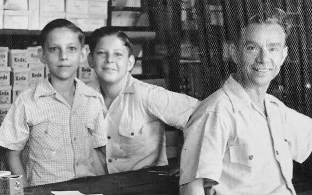 Juan Bradman, center, with his brother Saloman and their father Julio, at their family’s shoe store in Matanzas, Cuba, 1949. (Courtesy Miriam Bradman Abrahams via JTA)