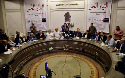 Egyptian politician Gamila Ismail (C) speaks during a press conference of executives of the Free Current opposition vovement in Cairo, on August 28, 2023, as they respond to the detention of Hisham Kassem. (Khaled Desouki/AFP)