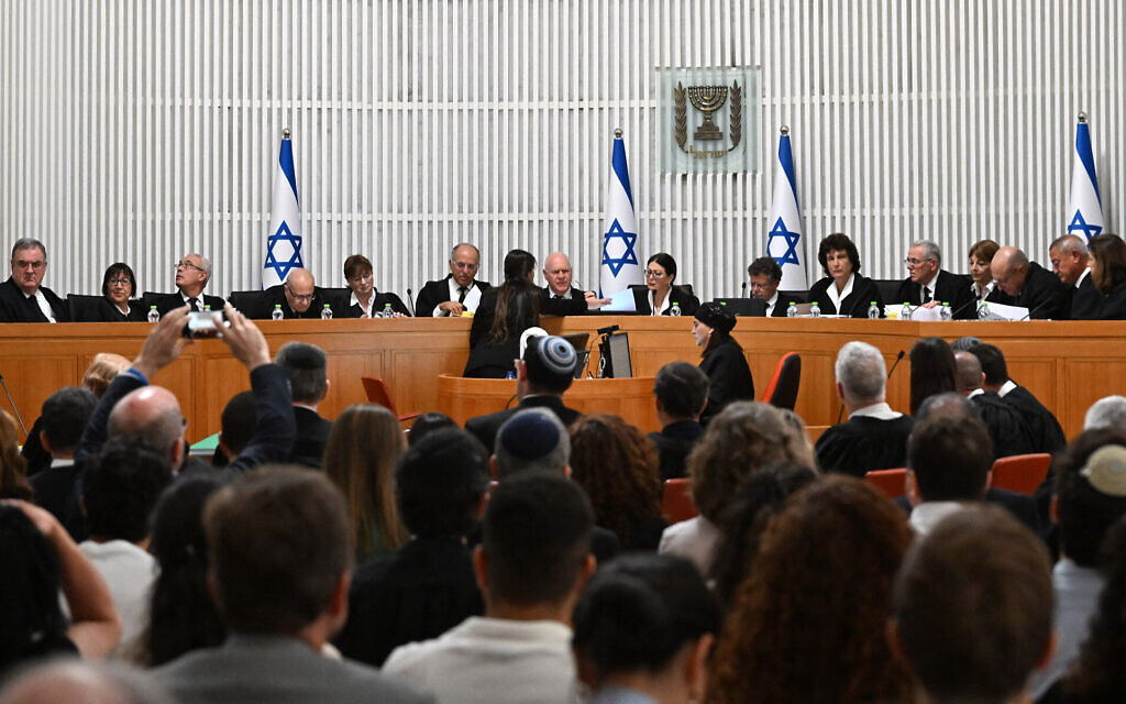 Supreme Court President Esther Hayut and all 14 other judges hear petitions against the 'reasonableness law' at the court in Jerusalem on September 12, 2023. (DEBBIE HILL / POOL / AFP)