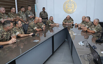 This handout picture released on the X account (formerly Twitter) of the Lebanese Army on September 14, 2023 shows Lebanese Army Chief Joseph Aoun meeting with soldiers at the Mohammad Zgheib Barracks in the southern coastal city of Sidon amid ongoing clashes in the Ain al-Helwe refugee camp. (Handout/Twitter account of Lebanese Army/AFP)
