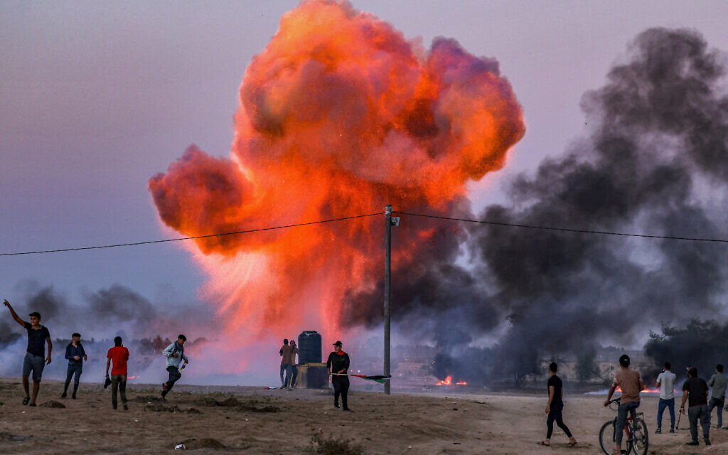 Palestinians set off explosions amid cross-border clashes with Israeli security forces near Khan Yunis in the southern Gaza Strip on September 27, 2023. (Said Khatib/AFP)
