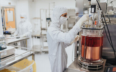 A Pluri employee at one of the company's bioreactors. (Courtesy)