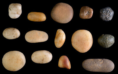 Colored quartz pebbles, likely used for divination, found along the Pilgrimage Road. (Clara Amit, IAA)