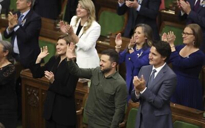 Ukrainian President Volodymyr Zelensky and Prime Minister Justin Trudeau join a standing ovation for Yaroslav Hunka, who was in attendance in the House of Commons in Ottawa, Ontario, on Friday, Sept. 22, 2023. The speaker of Canada’s House of Commons apologized Sunday, Sept. 24, for recognizing Hunka, 98, who fought in a Nazi military unit during World War II.(Patrick Doyle/The Canadian Press via AP)