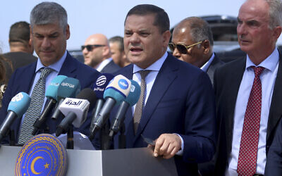 Libyan Prime Minister Abdul-Hamid Dbeibeh delivers a speech in Tripoli, Libya, July 24, 2023. (AP Photo/Yousef Murad)