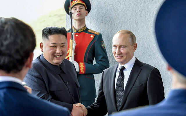 Russian President Vladimir Putin, center right, and North Korea's leader Kim Jong Un shake hands during their meeting in Vladivostok, Russia, Thursday, April 25, 2019.  (Yuri Kadobnov/Pool Photo via AP, File)