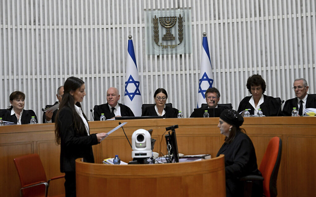 Supreme Court President Esther Hayut and all 14 other judges hear petitions against the 'reasonableness law' at the court in Jerusalem on September 12, 2023. (DEBBIE HILL / POOL / AFP)